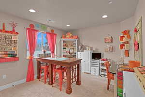 View of carpeted dining space