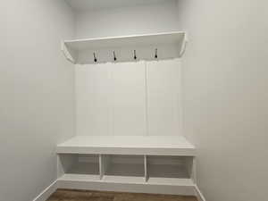 Mudroom featuring dark wood-type flooring