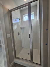 Bathroom featuring a shower with shower door