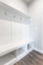 Mudroom with dark wood-type flooring