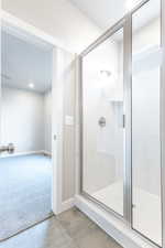 Bathroom with an enclosed shower