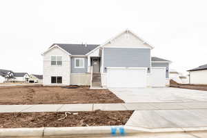 View of front of house with a garage