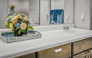 Owner's bathroom, featuring dual vanities, and an enclosed shower.