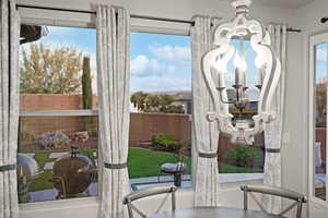 Kitchen adjacent dining area with panoramic sunrise views.