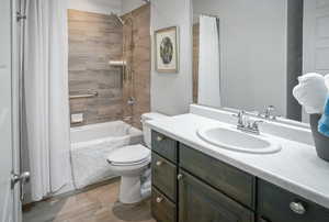 The second full bath features an upgraded tub with full tile surround.