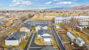 Birds eye view of property with a mountain view