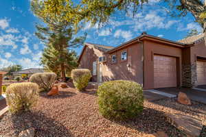 View of home's exterior featuring a garage