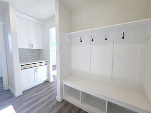 Mudroom with hardwood / wood-style floors