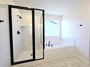 Bathroom with plus walk in shower