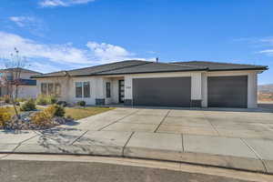 Ranch-style house with a garage