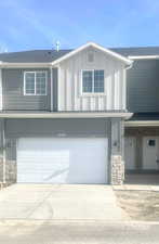 View of front of home featuring a garage