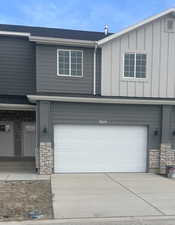 View of front of property featuring a garage