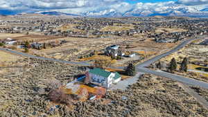 Drone / aerial view featuring a mountain view