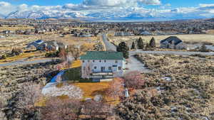 Drone / aerial view featuring a mountain view