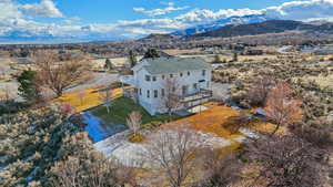 Birds eye view of property with a mountain view