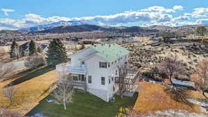 Aerial view featuring a mountain view