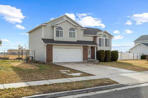 View of front property with a garage