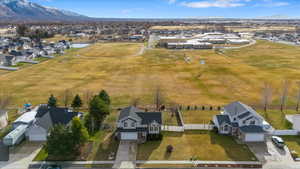 Birds eye view of property with a mountain view