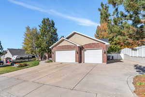 Spacious 3-car garage with extra parking space