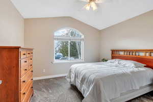 Beautiful window and vaulted ceiling in bedroom