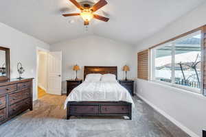 Primary suite has ceiling fan and lots of natural light