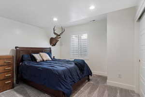 View of carpeted bedroom