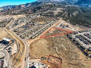 Birds eye view of property featuring a mountain view