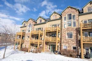 View of snow covered property