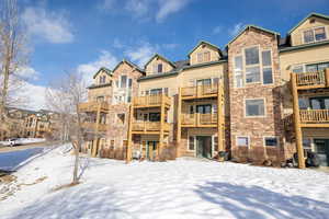 View of snow covered property