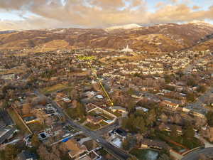 Aerial view at dusk featuring a mountain view