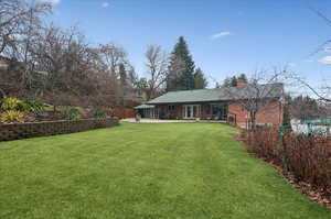 View of yard with a patio