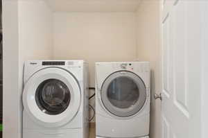 Clothes washing area with washing machine and dryer