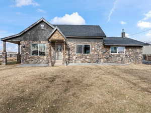 Craftsman inspired home with front lawn