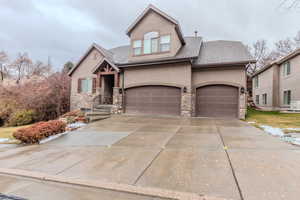 View of front of property with a garage