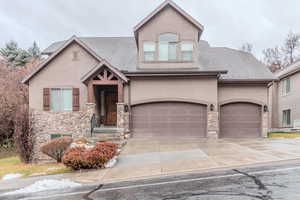 View of front of home featuring a garage