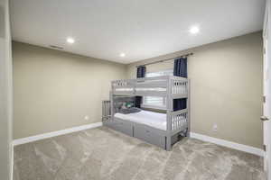 View of carpeted bedroom