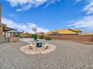 View of yard with a fire pit, a gazebo, a patio, and a hot tub