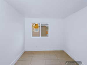 View of tiled spare room