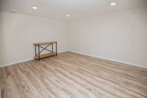 Unfurnished room featuring light hardwood / wood-style floors