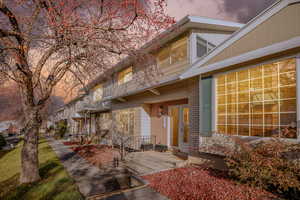 View of exterior entry at dusk