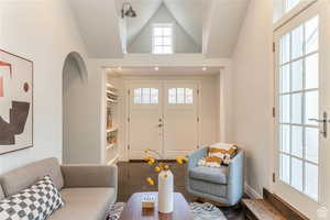 Family room with high vaulted ceiling