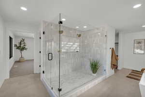 Bathroom featuring an enclosed shower