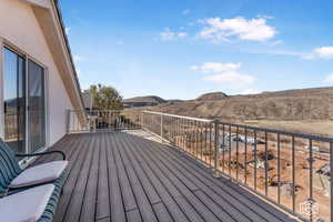 Wooden deck featuring a mountain view