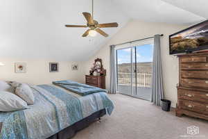 Bedroom with ceiling fan, access to exterior, lofted ceiling, and light carpet