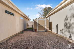 View of yard with a storage unit/RV Parking