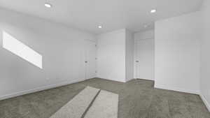 View of carpeted spare room