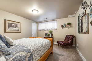 Bedroom with carpet flooring