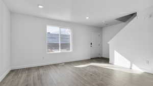 Foyer featuring wood-type flooring