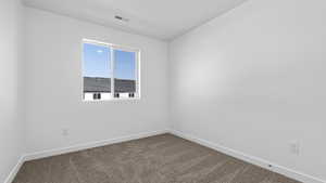 View of carpeted empty room