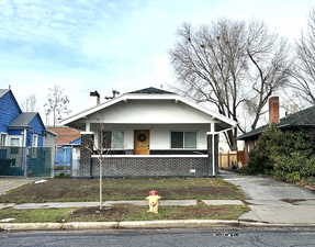 Bungalow-style home featuring covered porch